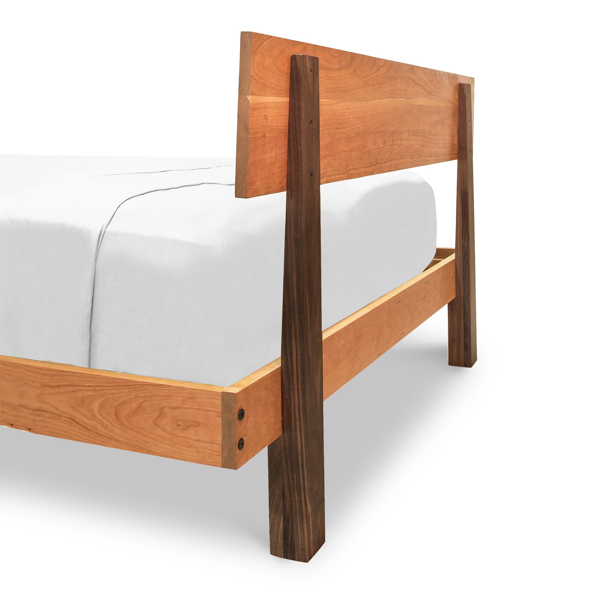 King-size Modern American Platform Bed by Vermont Furniture Designs with a light brown headboard, dark brown legs, and white mattress, shown from rear corner.