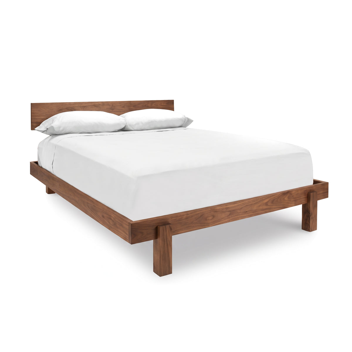 Modern American Platform Bed with white bedding and two pillows by Vermont Furniture Designs on a white background.