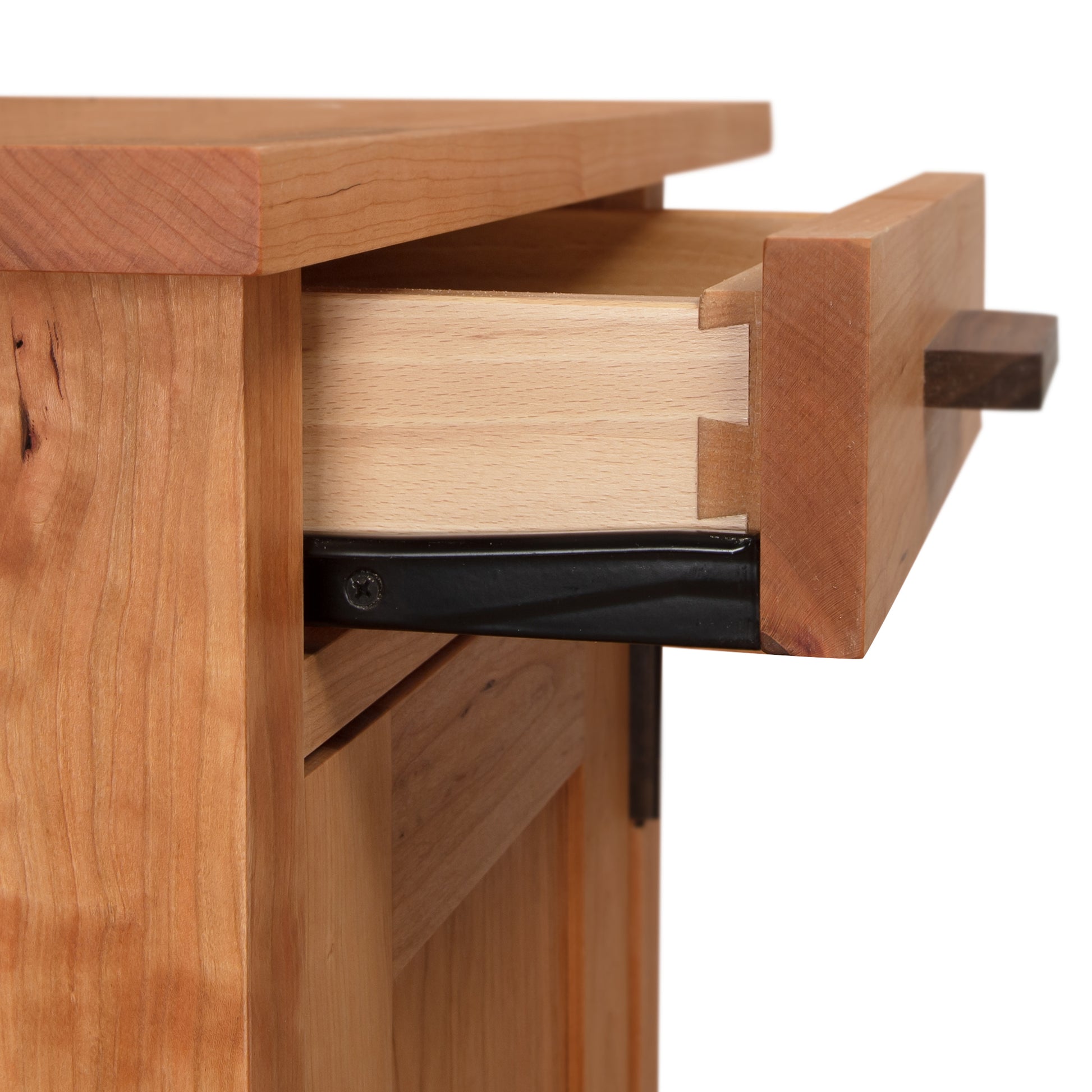 Modern Craftsman Nightstand by Vermont Furniture Designs, showcasing its solid hardwood construction and smoothly gliding metal drawer slide.