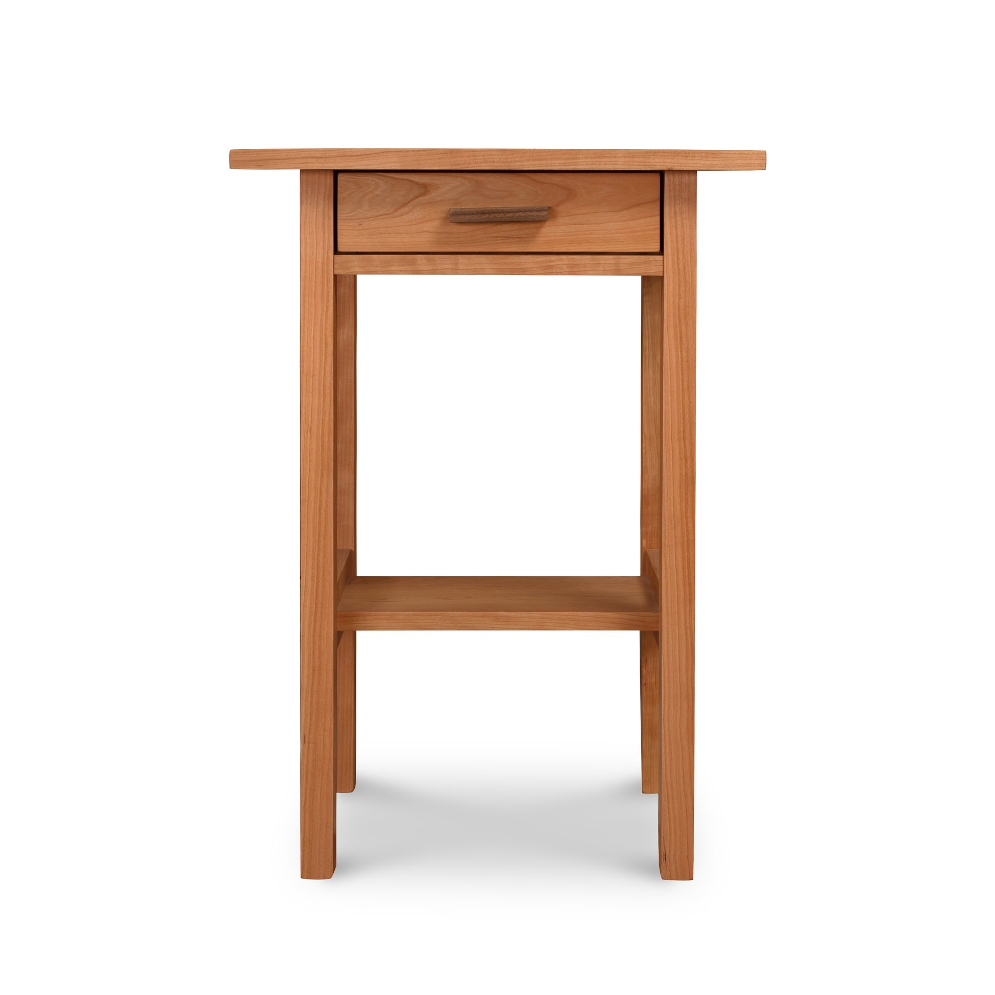 A Modern Craftsman 1-Drawer Open Shelf Nightstand by Vermont Furniture Designs, standing against a white background and showcasing natural wood construction.