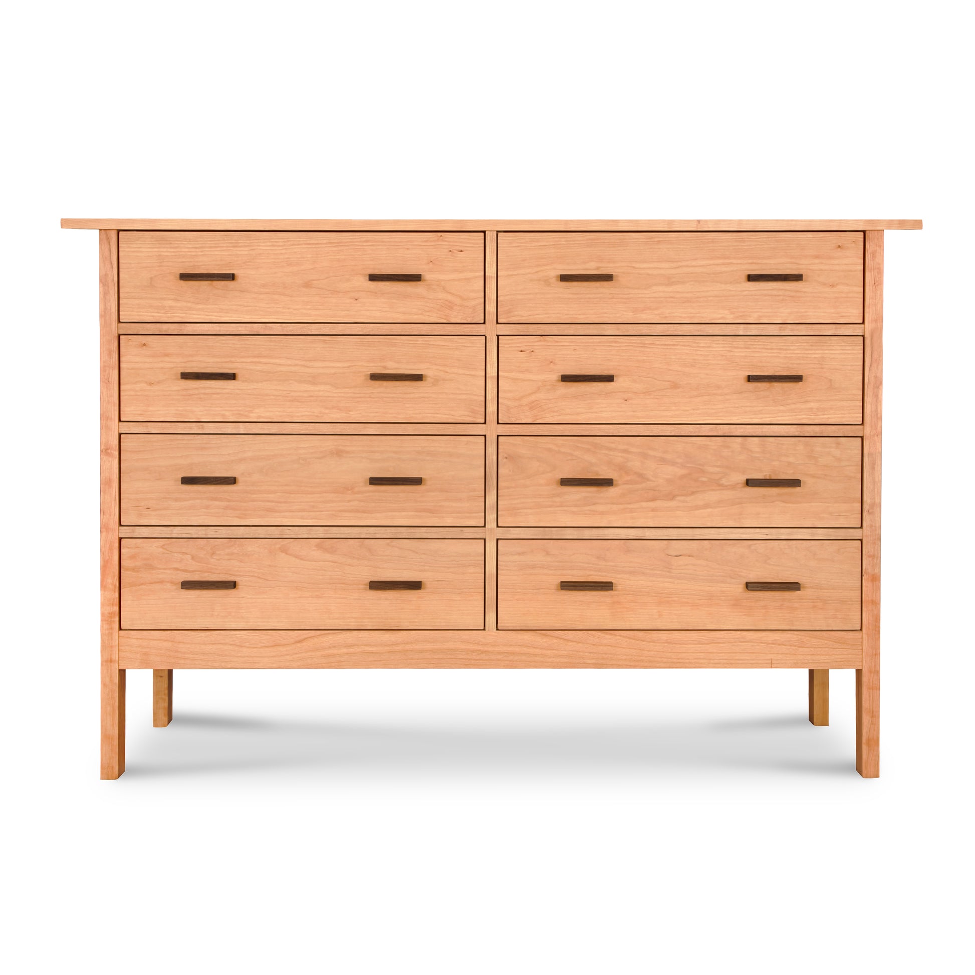 Modern Craftsman 8-drawer dresser by Vermont Furniture Designs with natural wood finish and simple rectangular handles.