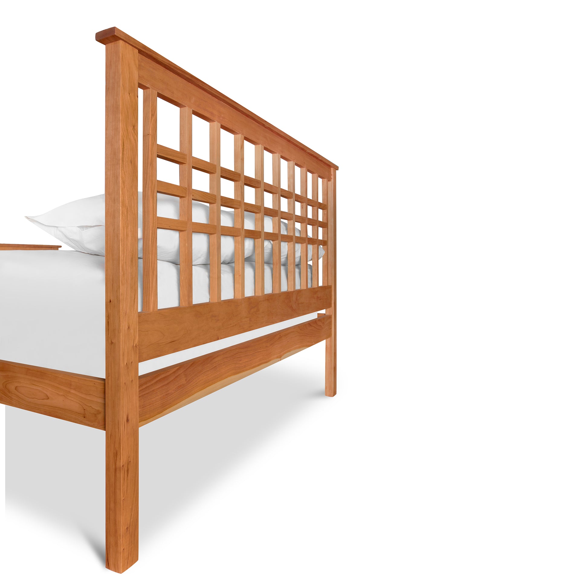 Modern Craftsman High Footboard Bed by Vermont Furniture Designs with lattice-style headboard and white pillow.