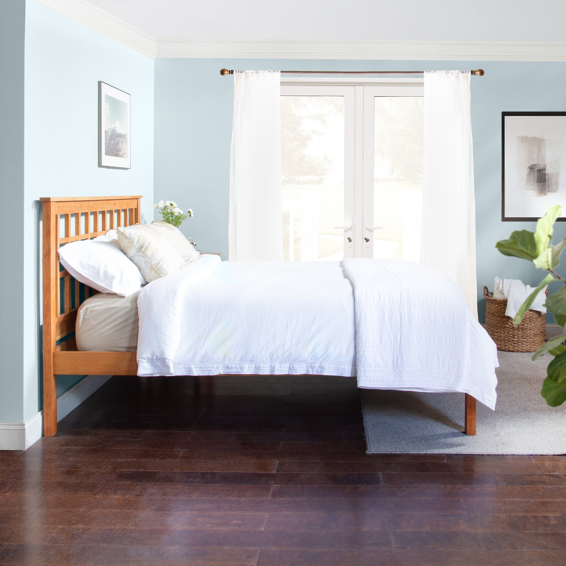 Vermont Furniture Designs Modern Craftsman Low Footboard Bed with white bedding.
