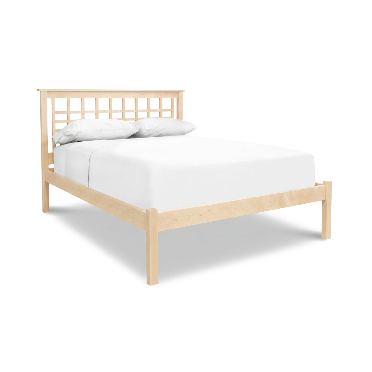 Modern Craftsman low footboard bed with lattice headboard by Vermont Furniture Designs, featuring a white mattress and pillows.