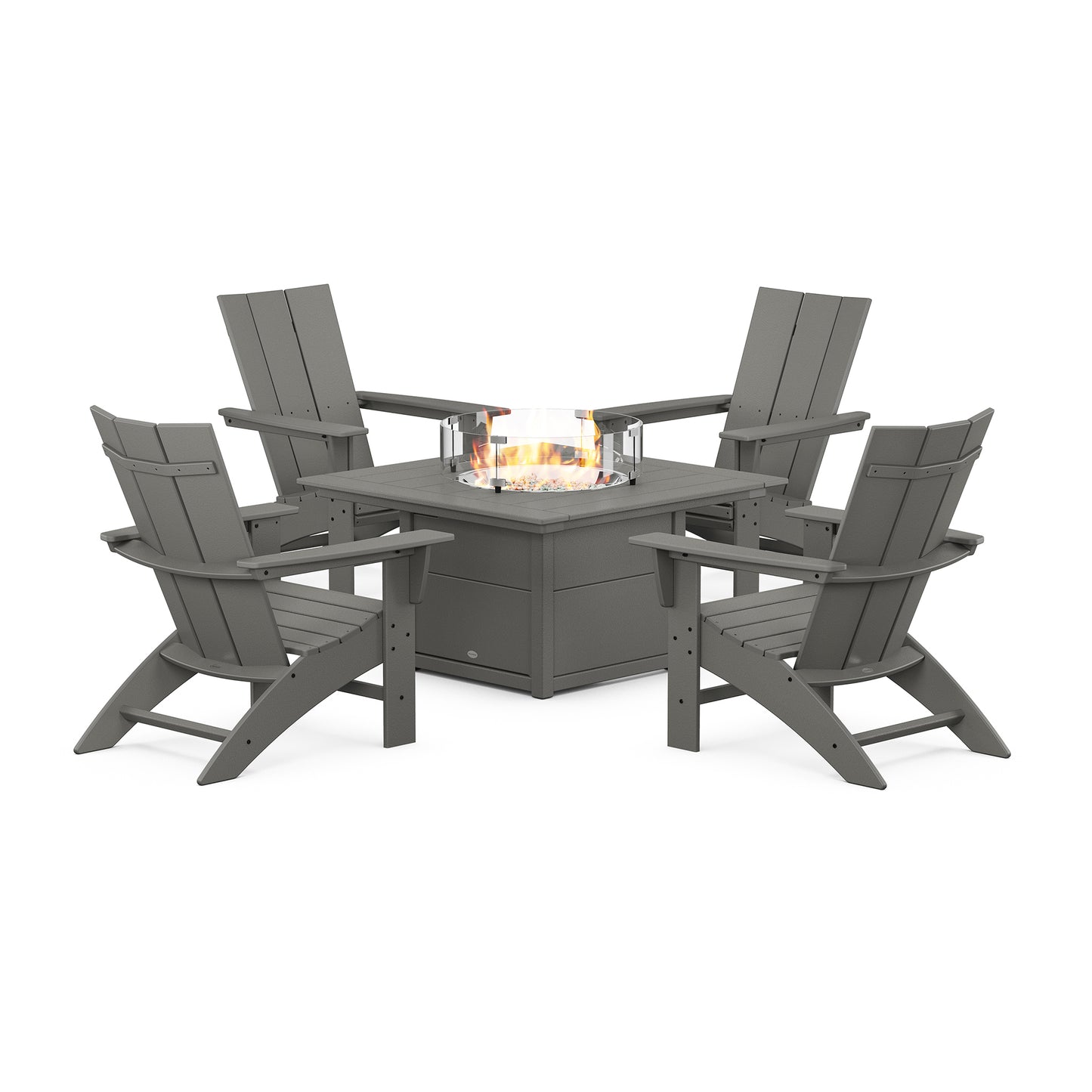 Gray POLYWOOD chairs from the Modern Curveback Adirondack 5-Piece Set encircle a central fire pit table, perfect for outdoor gatherings.
