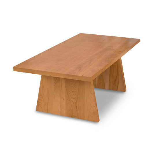 Modern Designer Coffee Table by Lyndon Furniture made from sustainable solid wood, featuring a flat top and distinctive angled panel legs.
