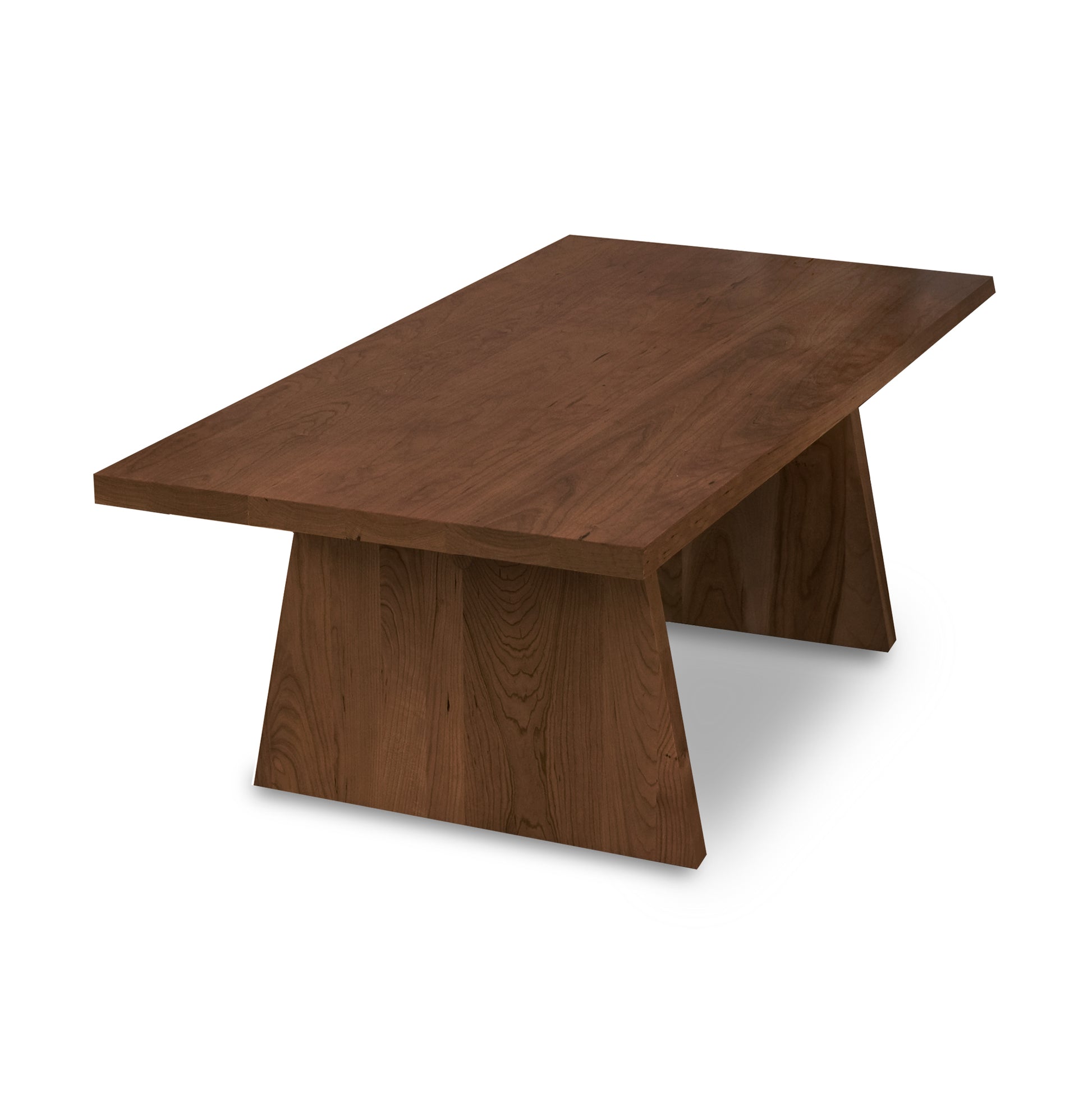 Lyndon Furniture Modern Designer Coffee Table with flat top and wide angled legs, highlighting its contemporary design.