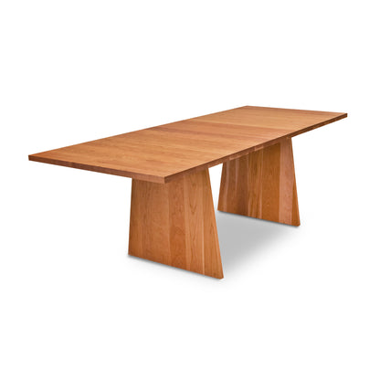 An eco-friendly Lyndon Furniture wooden Modern Designer Extension Table with a modern designer base.