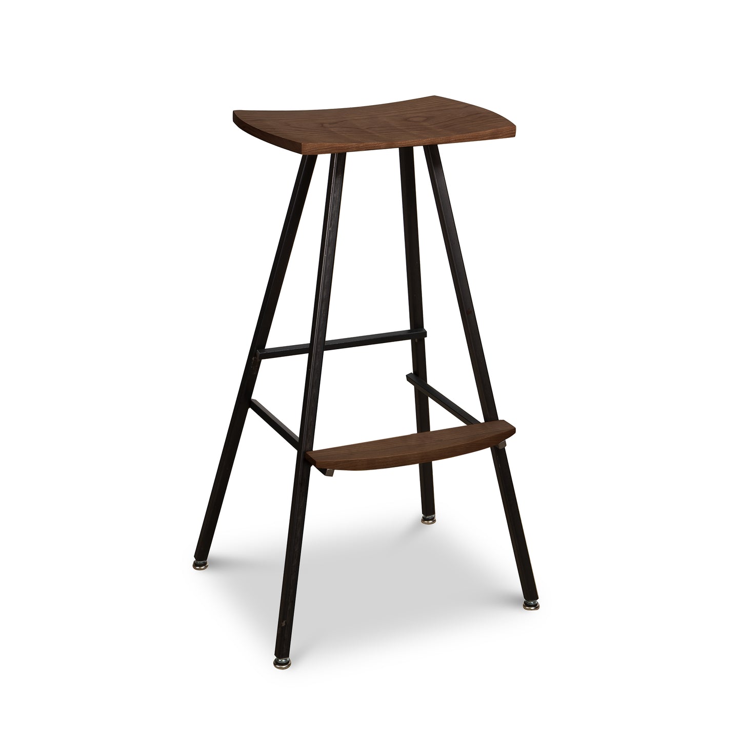 Modern Industrial Stool with a curved wooden seat, angled metal legs, and integrated footrest handcrafted by Vermont Woods Studios.