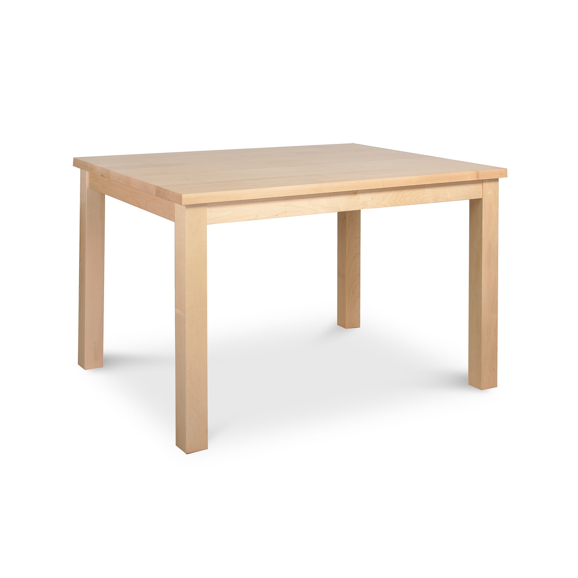 A light wood, eco-friendly rectangular table with a simple design features four straight legs and a flat surface. The table has a natural finish, highlighting the wood grain. Handcrafted in Vermont, the Modern Mission Parsons Solid Top Table - Maple - 36"x48" by Lyndon Furniture is suitable for dining, working, or general use.