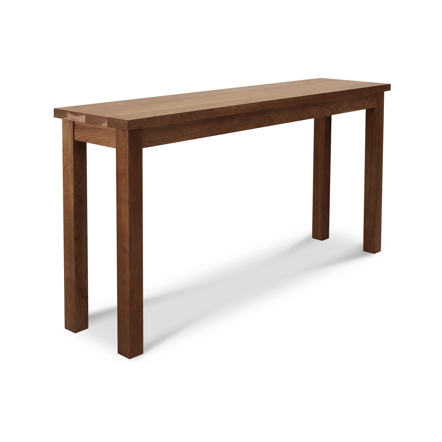 A handcrafted Modern Mission Sofa Table made of natural walnut by Lyndon Furniture on a white background.