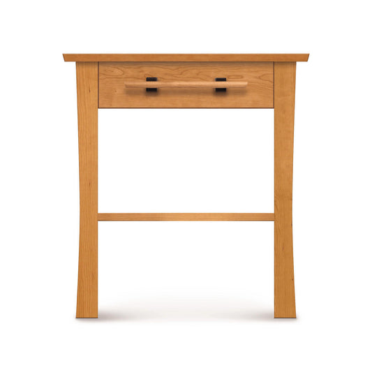 Copeland Furniture Monterey nightstand in solid cherry wood with black handles and slightly curved legs.