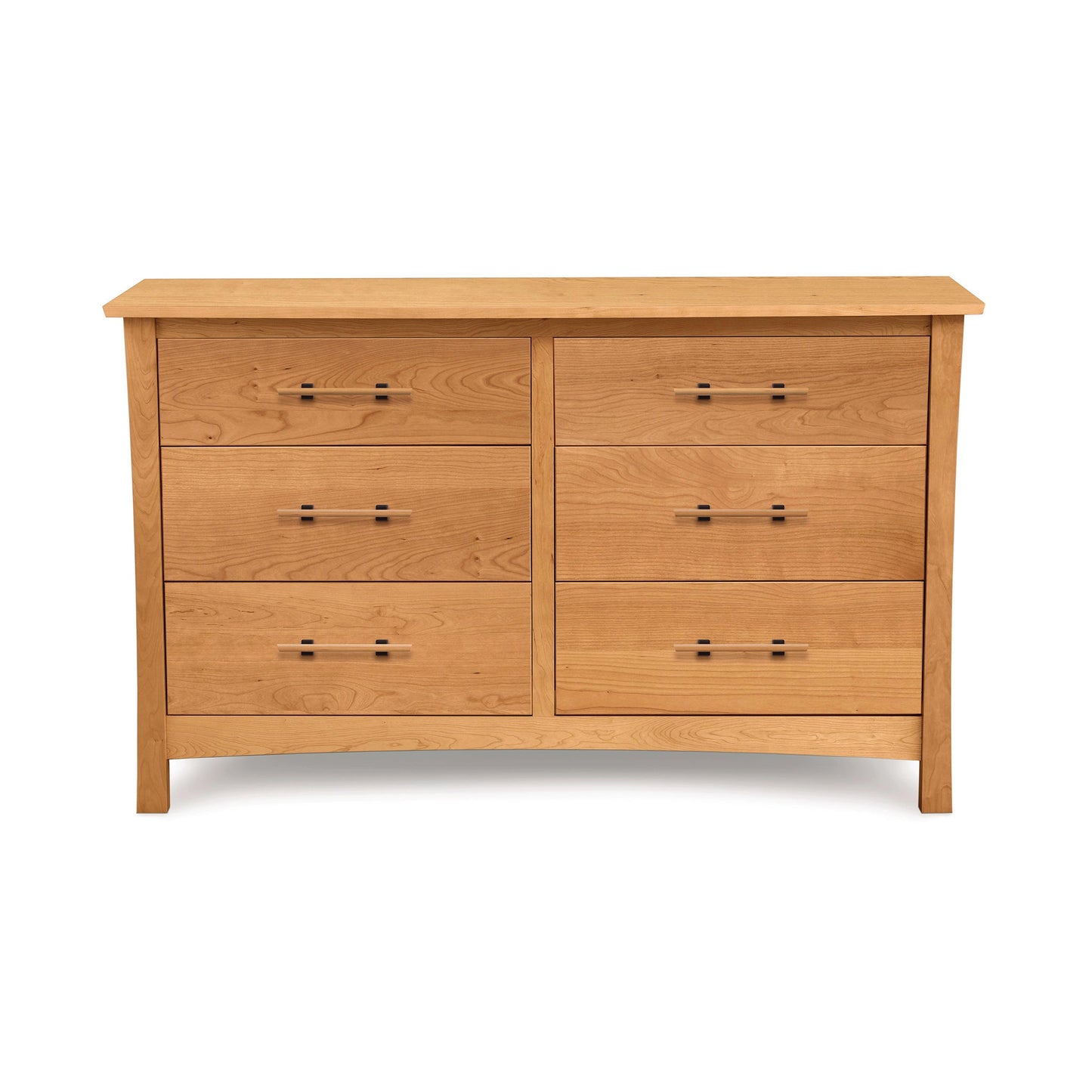 A wooden dresser with four drawers.