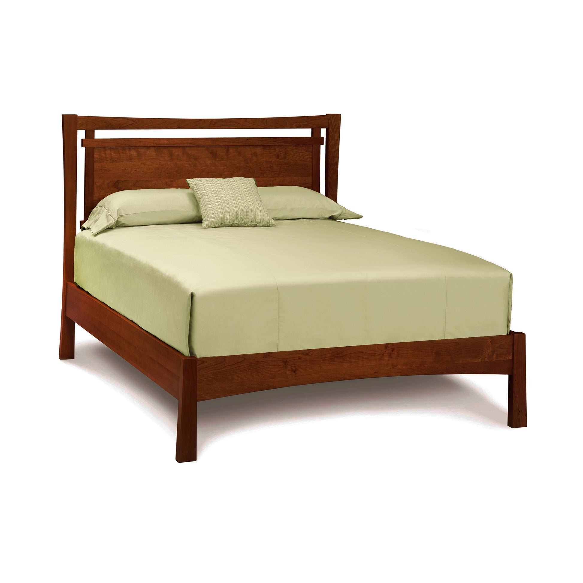 Copeland Monterey Platform Bed in solid cherry wood with simple light green bedding, showcasing elegant craftsmanship and clean lines.
