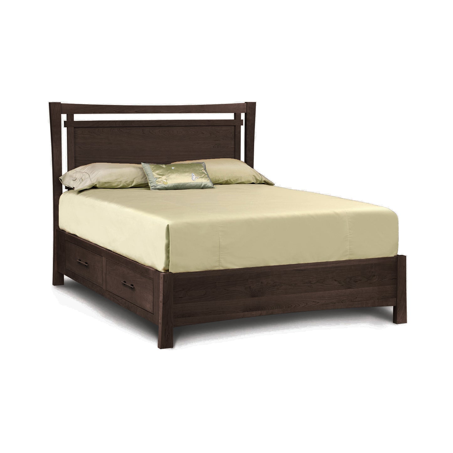 Copeland Monterey Storage Bed in cherry wood with headboard and spacious underbed drawers, shown with simple bedding and pillows.