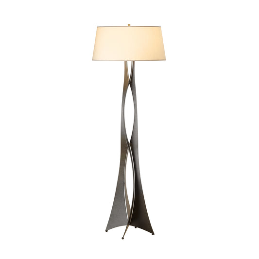 Hand-forged metal Moreau Floor Lamp by Hubbardton Forge with a twisted base and wide white shade, expertly crafted in Vermont.