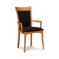 A Copeland Furniture Morgan Shaker Chair - Priority Ship upholstered dining chair with a black cushion.