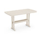 A simple, beige-colored wooden desk with a rectangular top and sturdy legs, featuring a horizontal support bar made of eco-friendly POLYWOOD® lumber, isolated on a white background.
