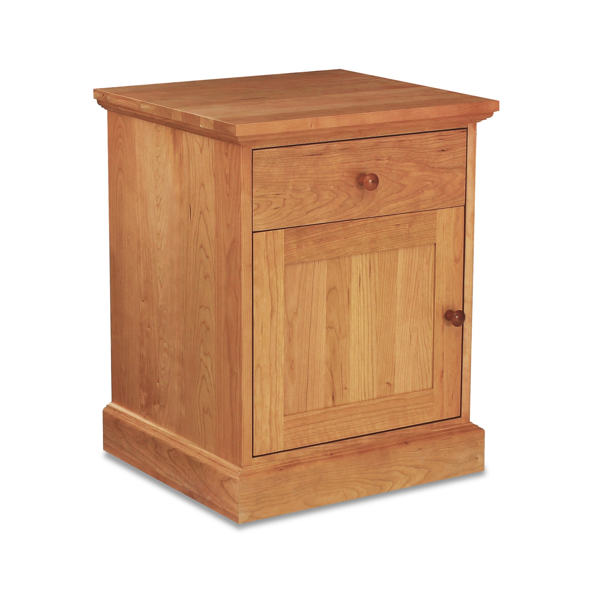 A small Lyndon Furniture New England Shaker 1-Drawer Nightstand with Door made of hardwood cherry.