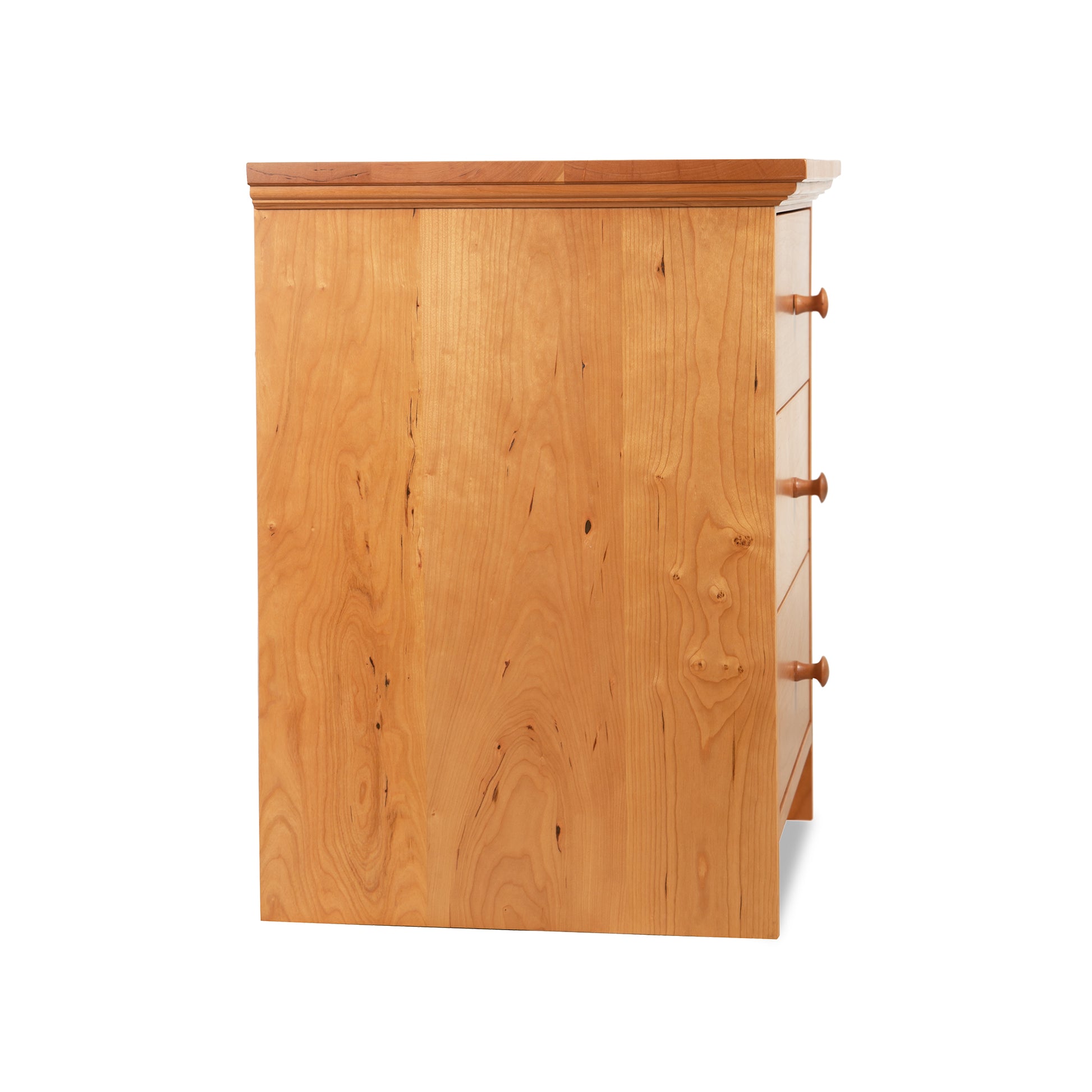 Light wood Lyndon Furniture New England Shaker 3-Drawer Nightstand with arched base, shown from the side.