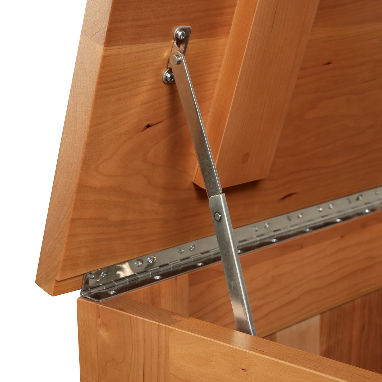 Lyndon Furniture New England Shaker Blanket Box lid crafted from North American hardwoods, highlighting fine wood grain and sturdy metal hinge.