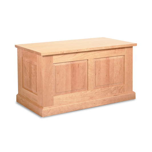 Lyndon Furniture New England Shaker Blanket Box with paneled sides and flat lid, crafted from hardwood, displayed clearly against a plain background.