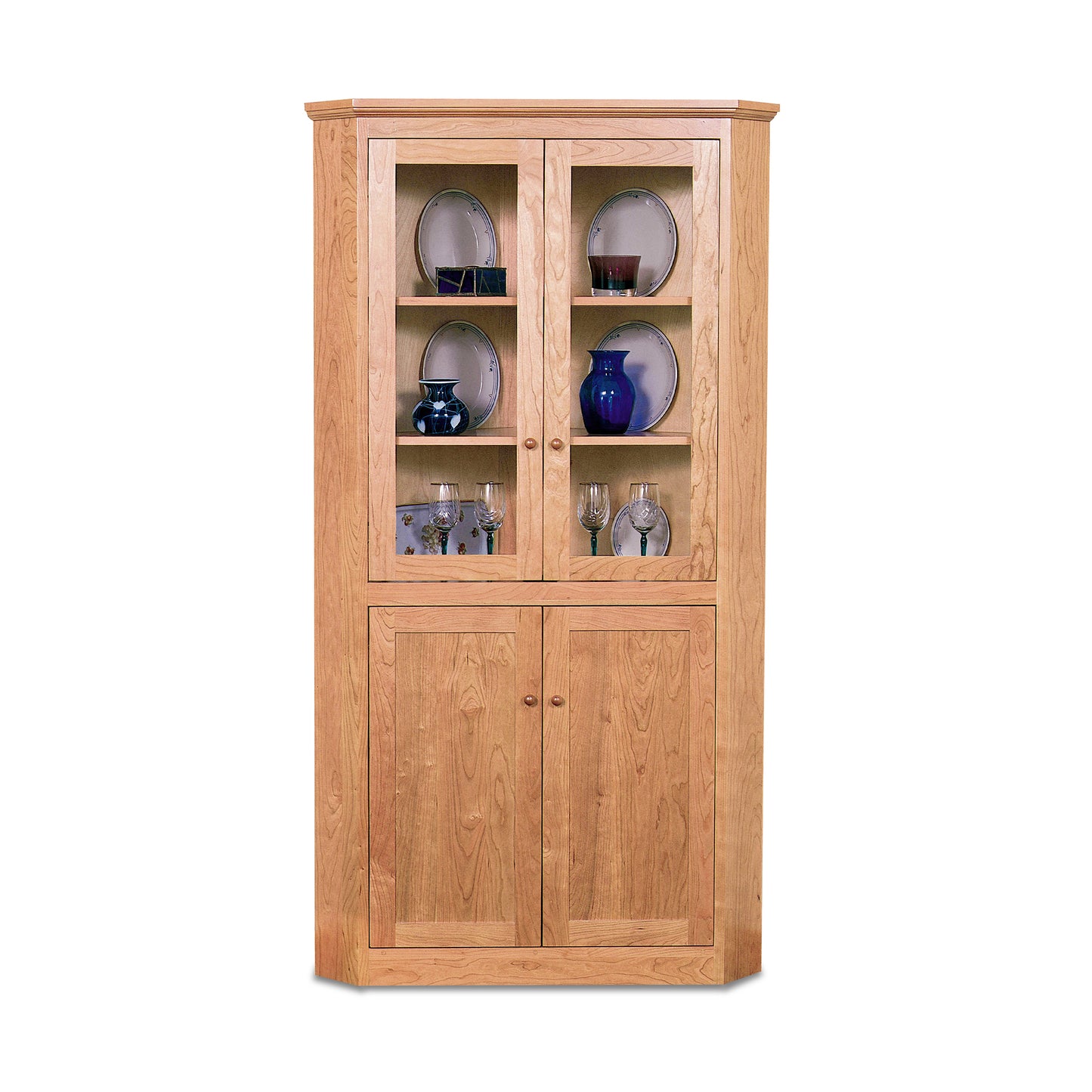 Lyndon Furniture New England Shaker Corner Cabinet with upper glass display doors and lower solid wood doors, handcrafted in classic Shaker style.
