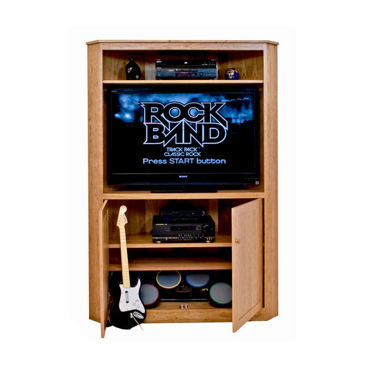 Lyndon Furniture New England Shaker Corner Entertainment Center featuring classic Shaker design, shown holding a TV on top with shelves below.