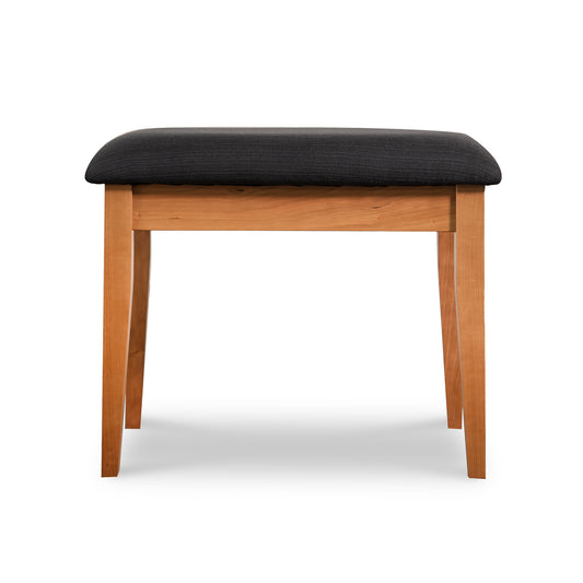 Lyndon Furniture New England Shaker Dressing Stool with four sturdy legs and a black cushioned seat, handcrafted in Vermont.