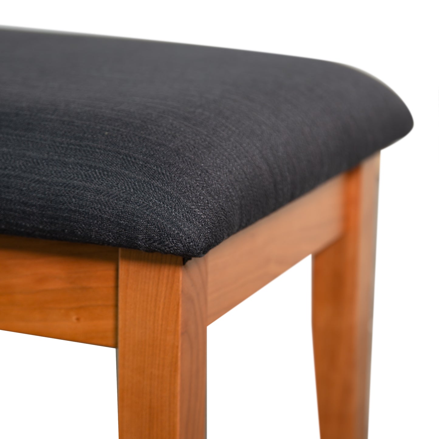 Lyndon Furniture New England Shaker Dressing Stool with a cushioned dark fabric seat and classic Shaker-style craftsmanship.