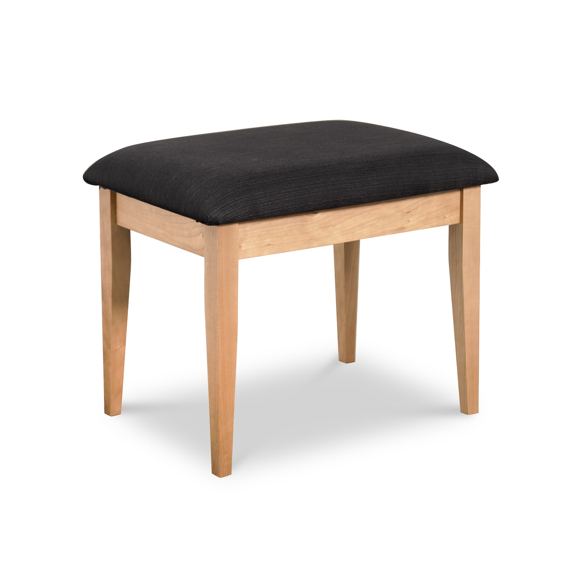Lyndon Furniture New England Shaker Dressing Stool with a black cushioned seat and light wood legs, handcrafted in Vermont.