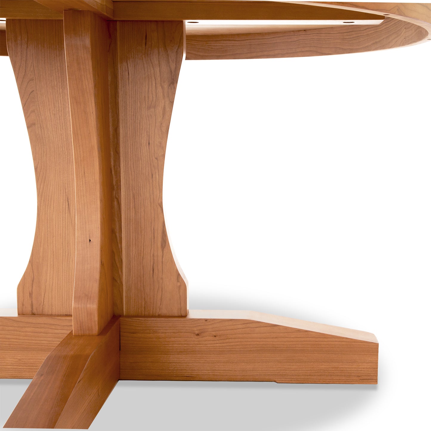 Handcrafted wooden base and legs of the Lyndon Furniture New Traditions Round Pedestal Table, highlighting fine craftsmanship.
