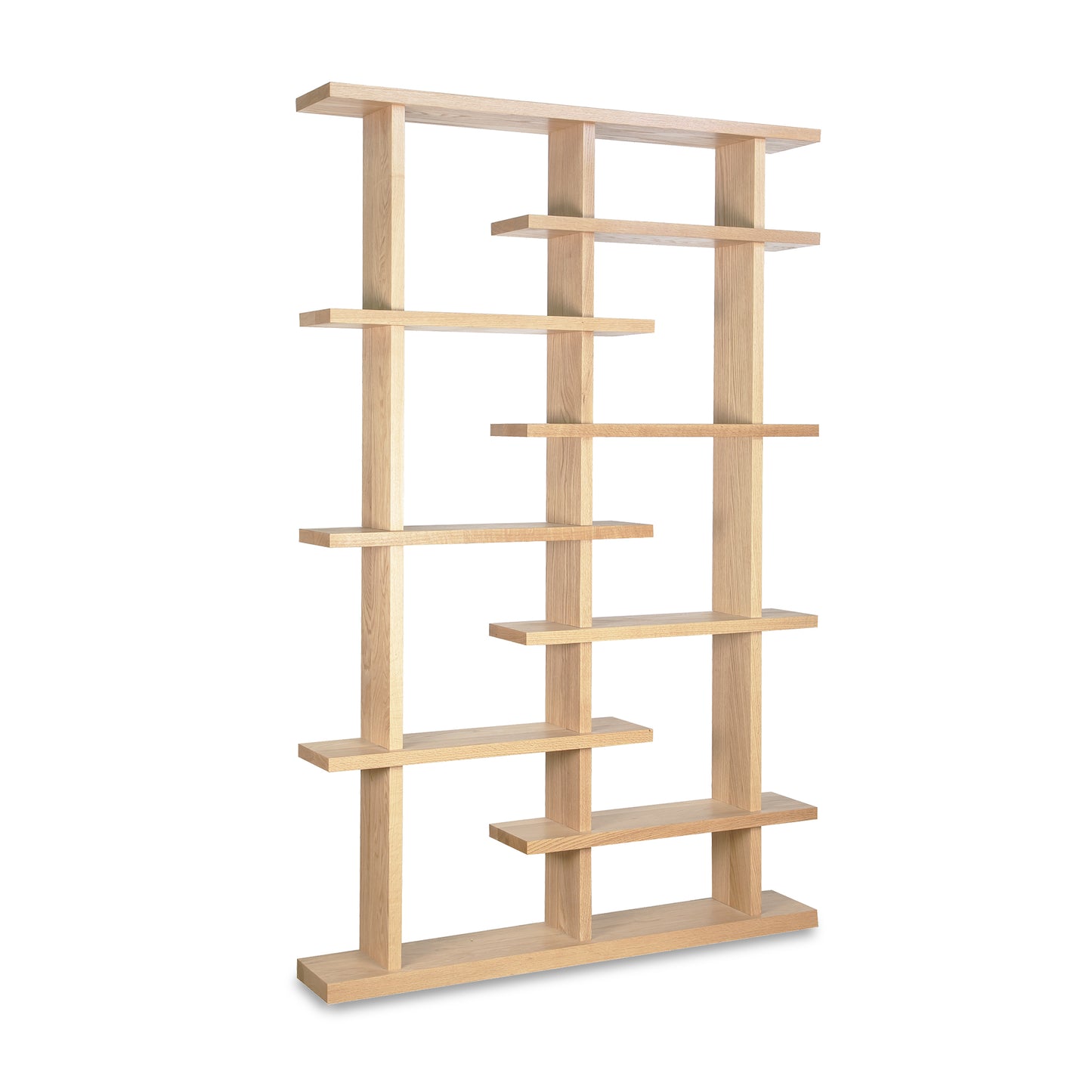Tall beige wood bookcase with asymmetrical rectangular shelves, designed by Lyndon Furniture, ideal for contemporary media center storage.
