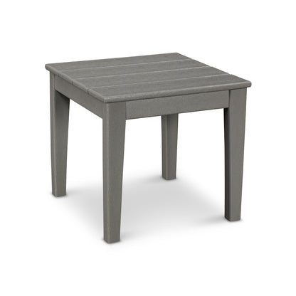 A simple gray POLYWOOD Newport 18" End Table with a textured surface on top and four sturdy, weather-resistant legs, isolated on a white background.