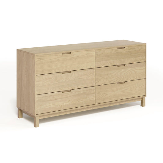 A Copeland Furniture Oslo 6-Drawer Dresser made of solid oak hardwood placed against a white background.