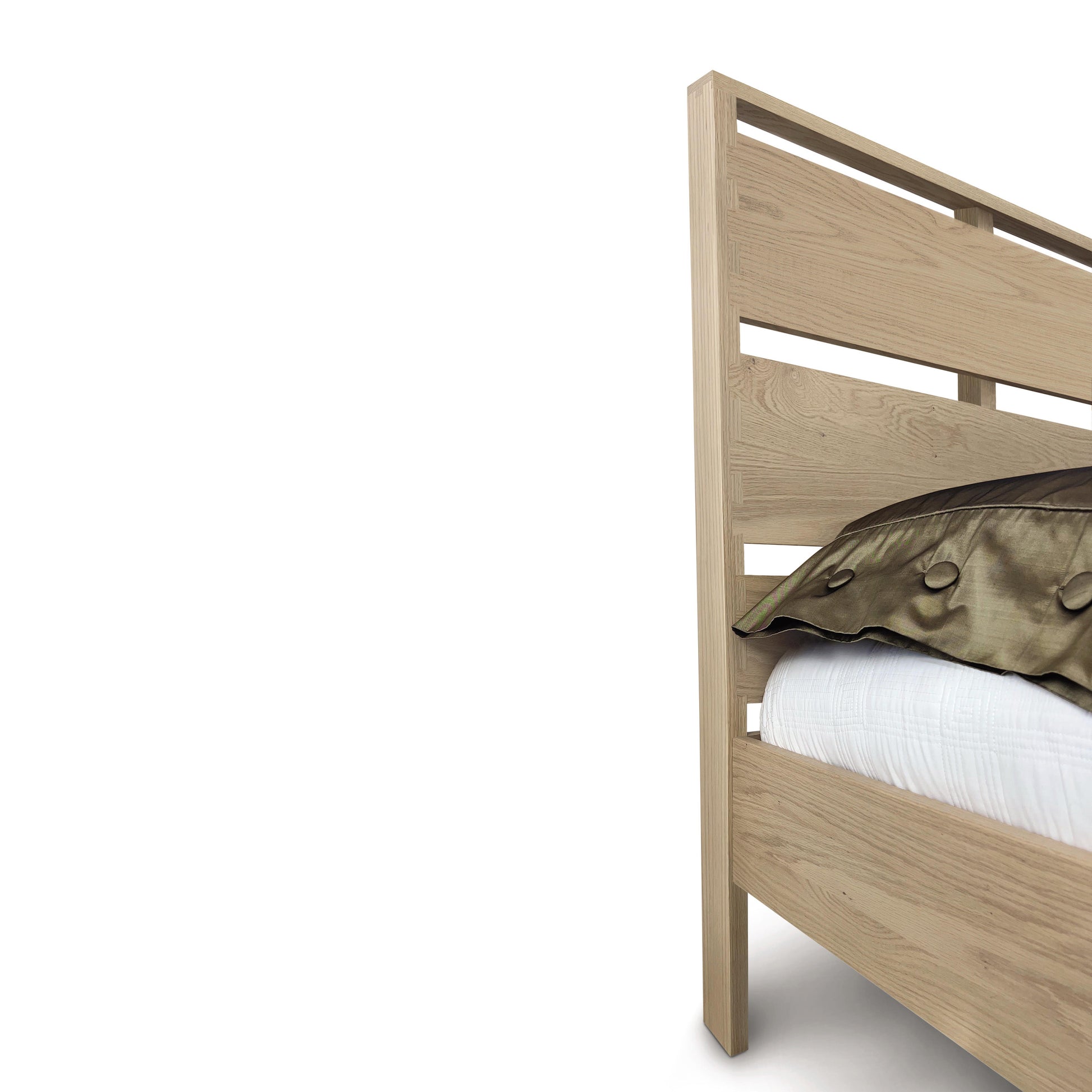 Copeland Furniture Oslo Platform Bed in solid oak hardwood, shown with a white mattress and greenish-brown blanket.