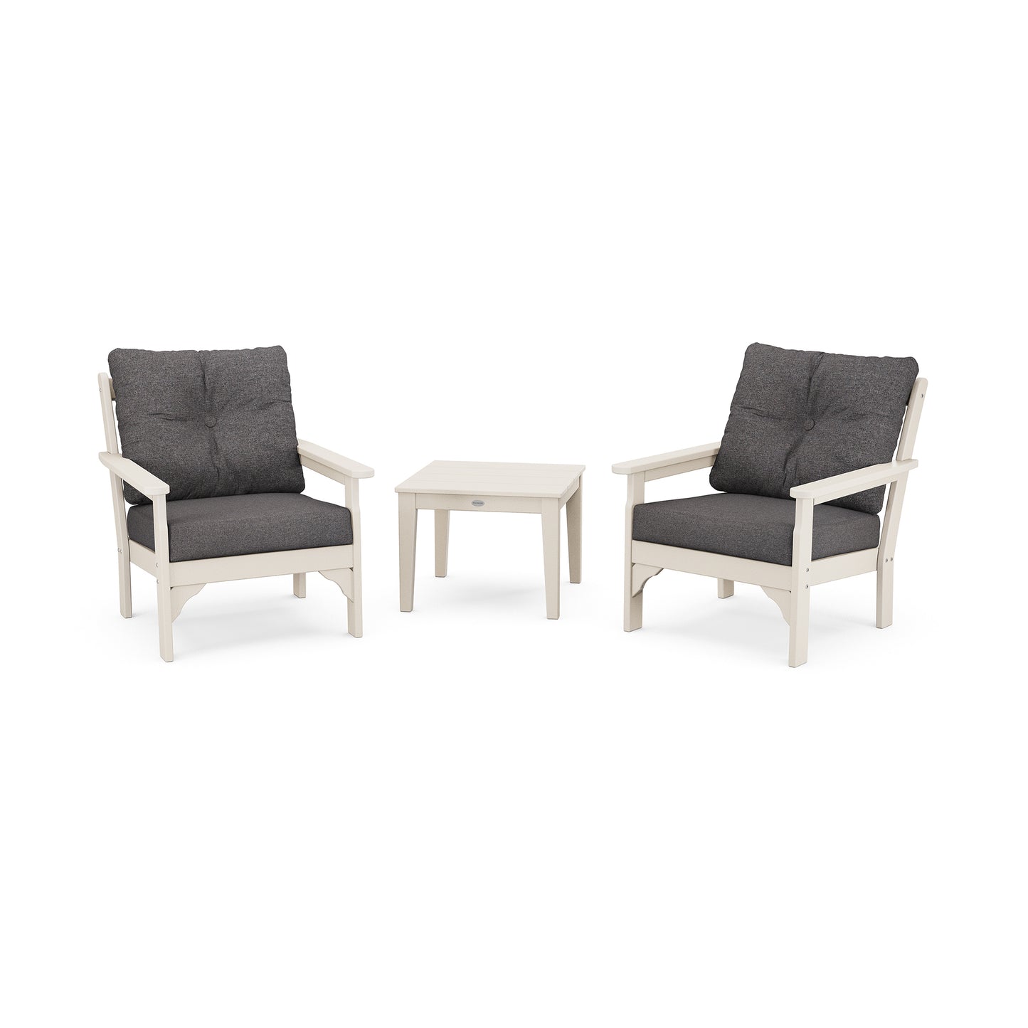 Two white POLYWOOD Vineyard outdoor chairs with deep seating cushions and a matching small white table, made from POLYWOOD® lumber, set against a white background.