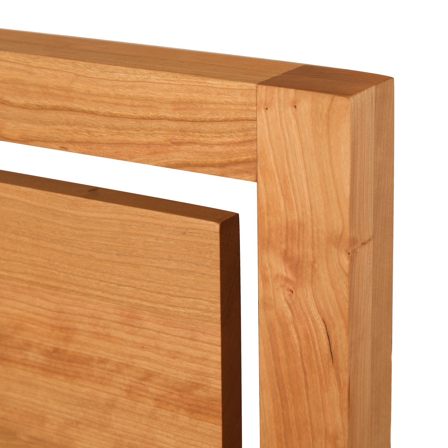 Pendant Bed corner by Vermont Furniture Designs, showcasing sustainable wood craftsmanship with an eco-friendly finish and intricate joinery.