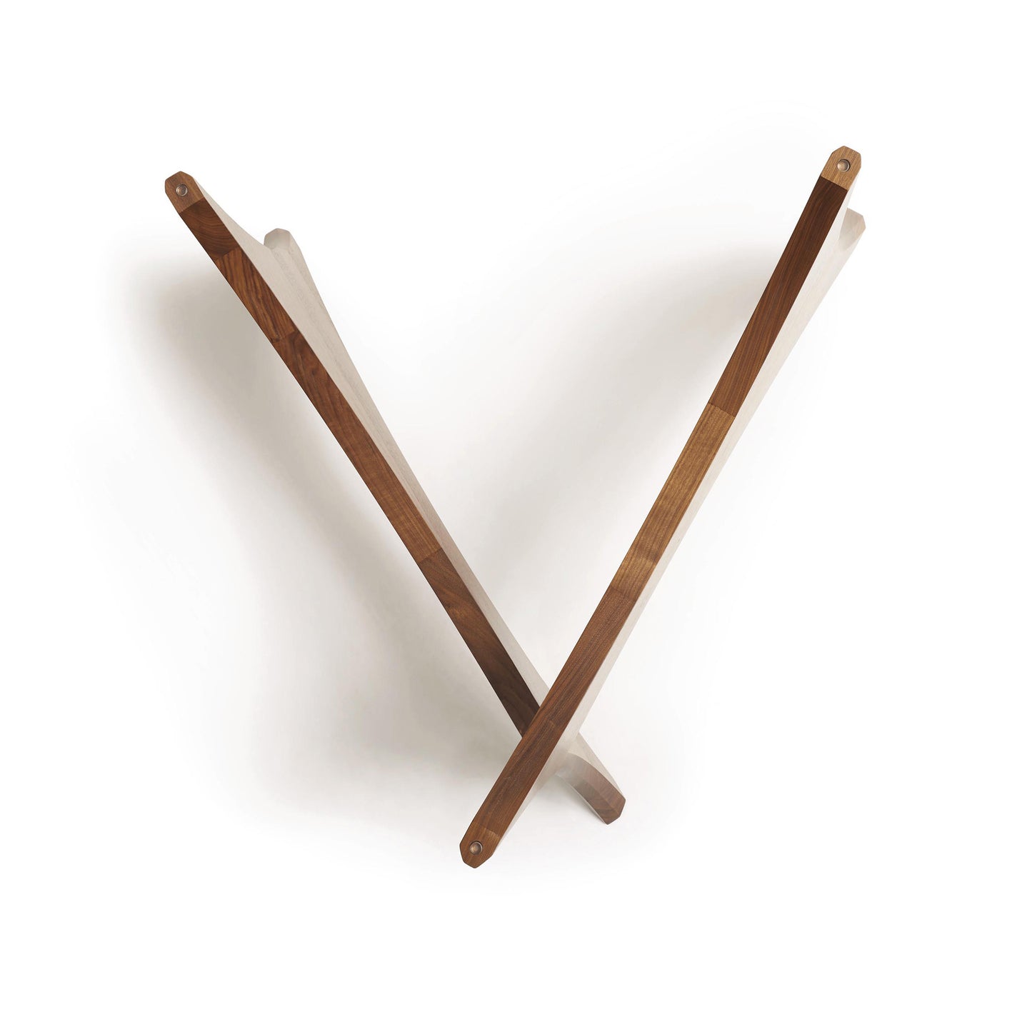 A walnut wooden Pivot Round Coffee Table in a v-shape viewed from above against a white background by Copeland Furniture.