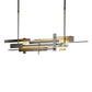 A Hubbardton Forge Planar LED Pendant, a Frank Lloyd Wright-inspired modern light fixture with metal bars hanging from it.