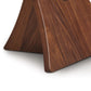 Wooden Planes Round Glass Top End Table made of natural walnut by Copeland Furniture, displaying fine grain detail, positioned on a white background.