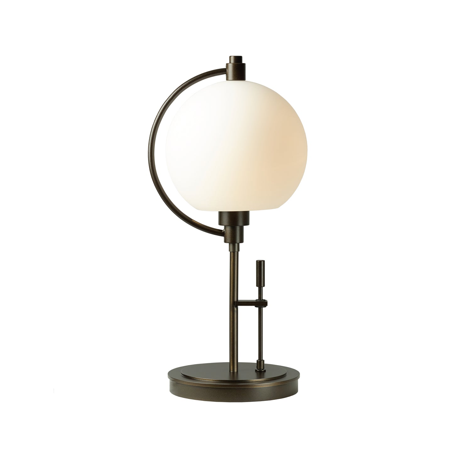 Hubbardton Forge Pluto Table Lamp with spherical white shade on dark metal base, showcasing handcrafted circular lighting.
