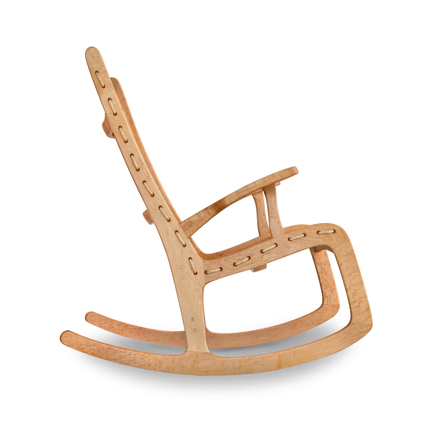 A Quilted Vermont Birdseye Maple Rocking Chair from Vermont Folk Rocker, with a modern design, crafted from birdseye maple, featuring interlocking pieces, viewed from a slight angle on a white background.