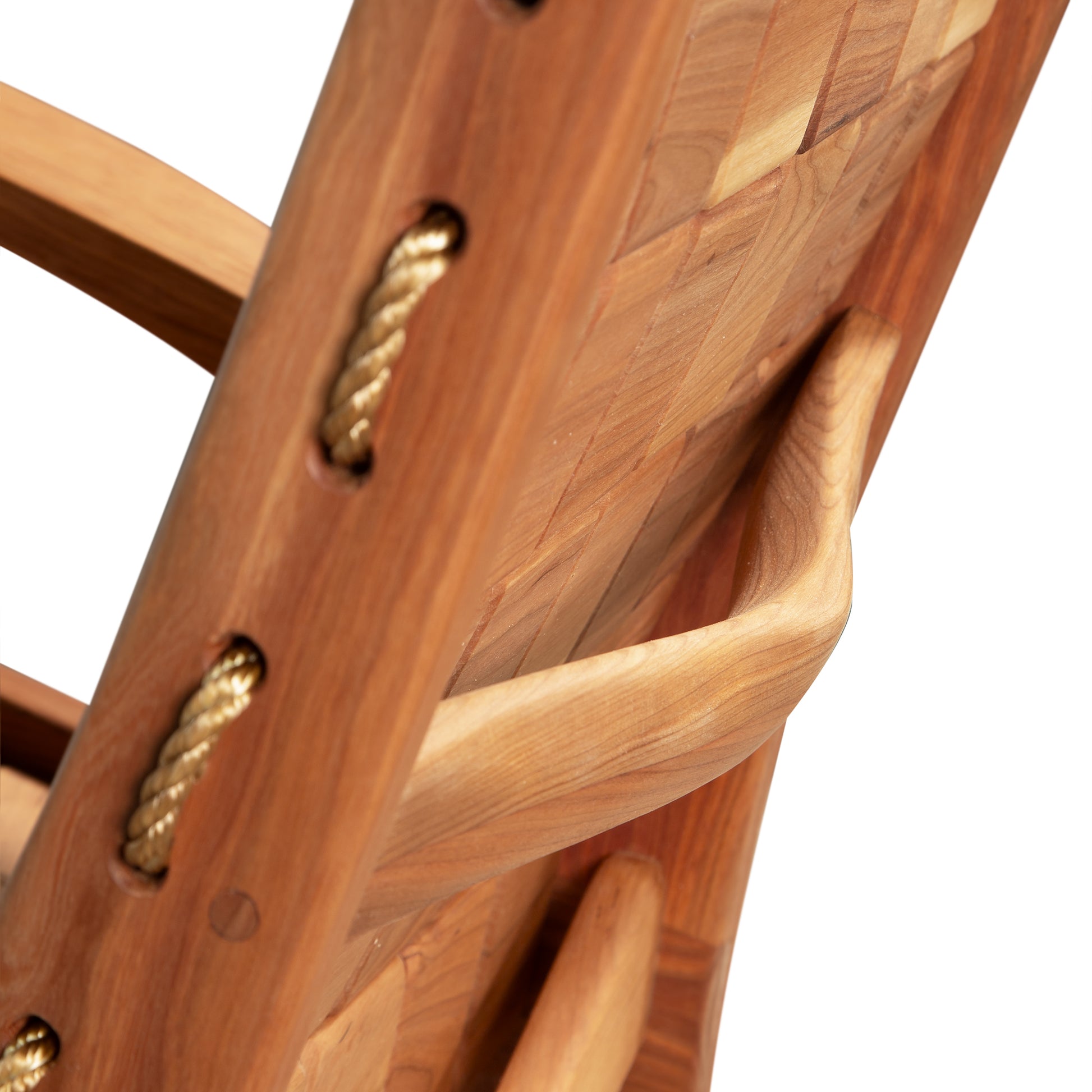 Detailed view of the Vermont Folk Rocker Special Order Quilted Rocking Chair backrest, highlighting exquisite gold rope accents and fine craftsmanship.