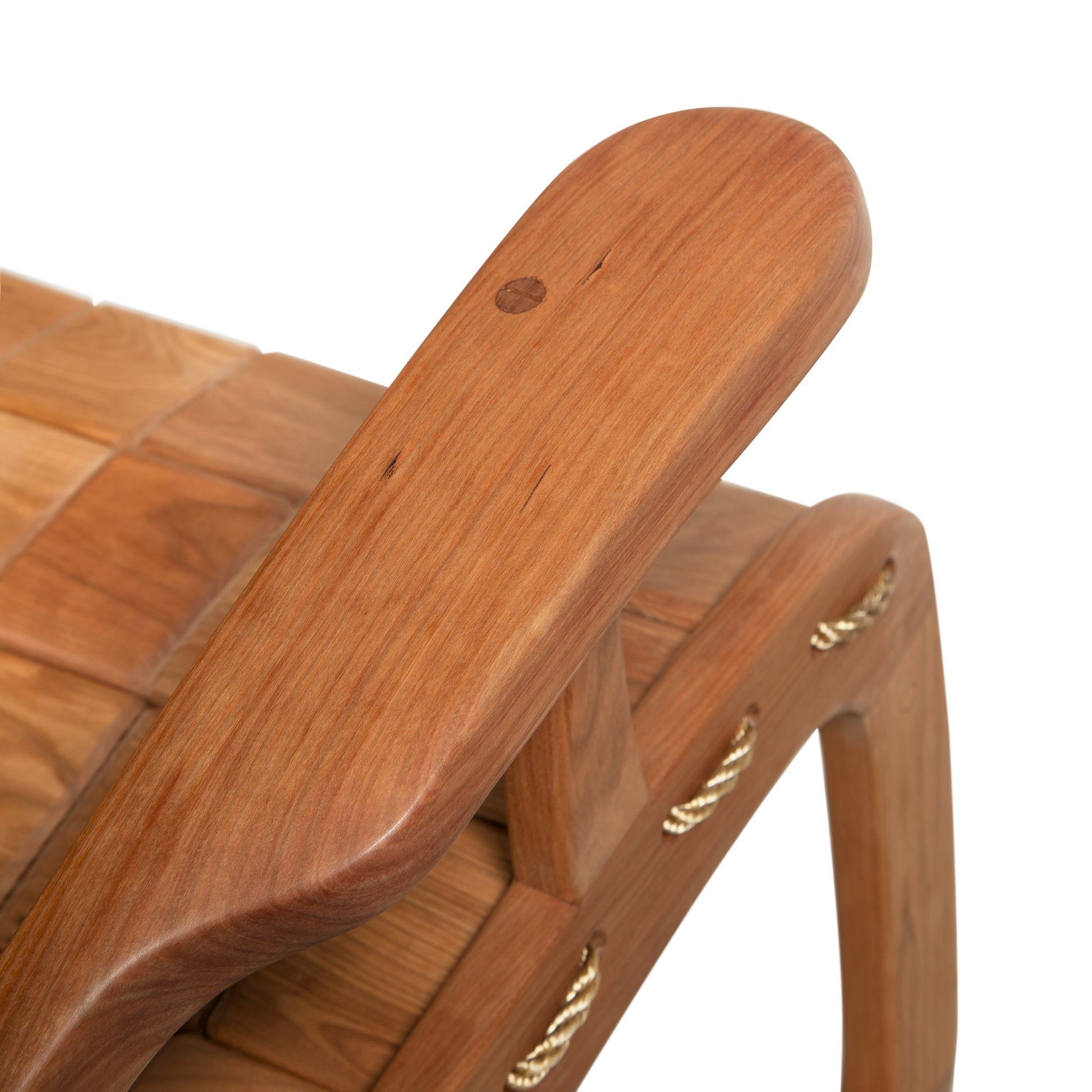 Close-up of Vermont Folk Rocker Special Order Quilted Rocking Chair highlighting smooth armrest finish and rich wood grain, handcrafted in Vermont.