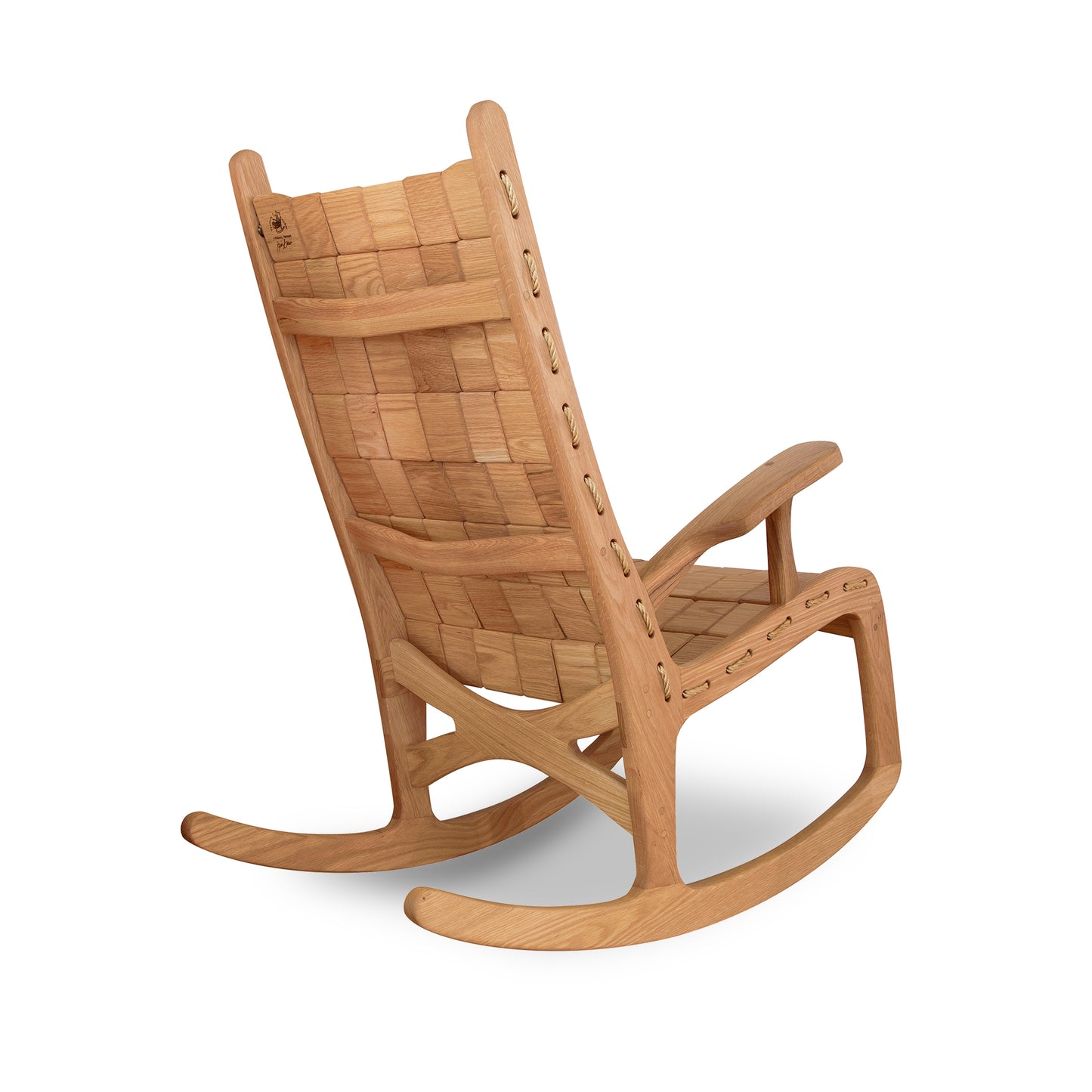 Quilted Vermont Oak Rocking Chair showcasing a woven backrest, seat, curved rockers, and armrests by Vermont Folk Rocker.