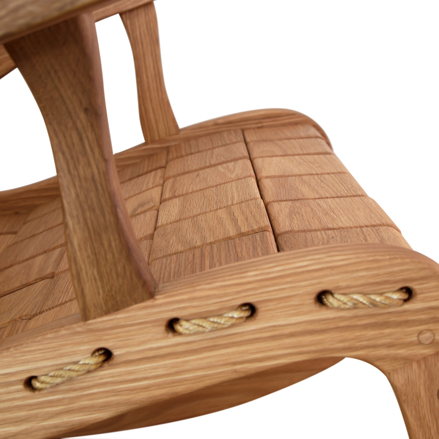 Quilted Vermont Oak Rocking Chair with woven seat, natural finish, rope accents; close-up of the Folk Rocker design.
