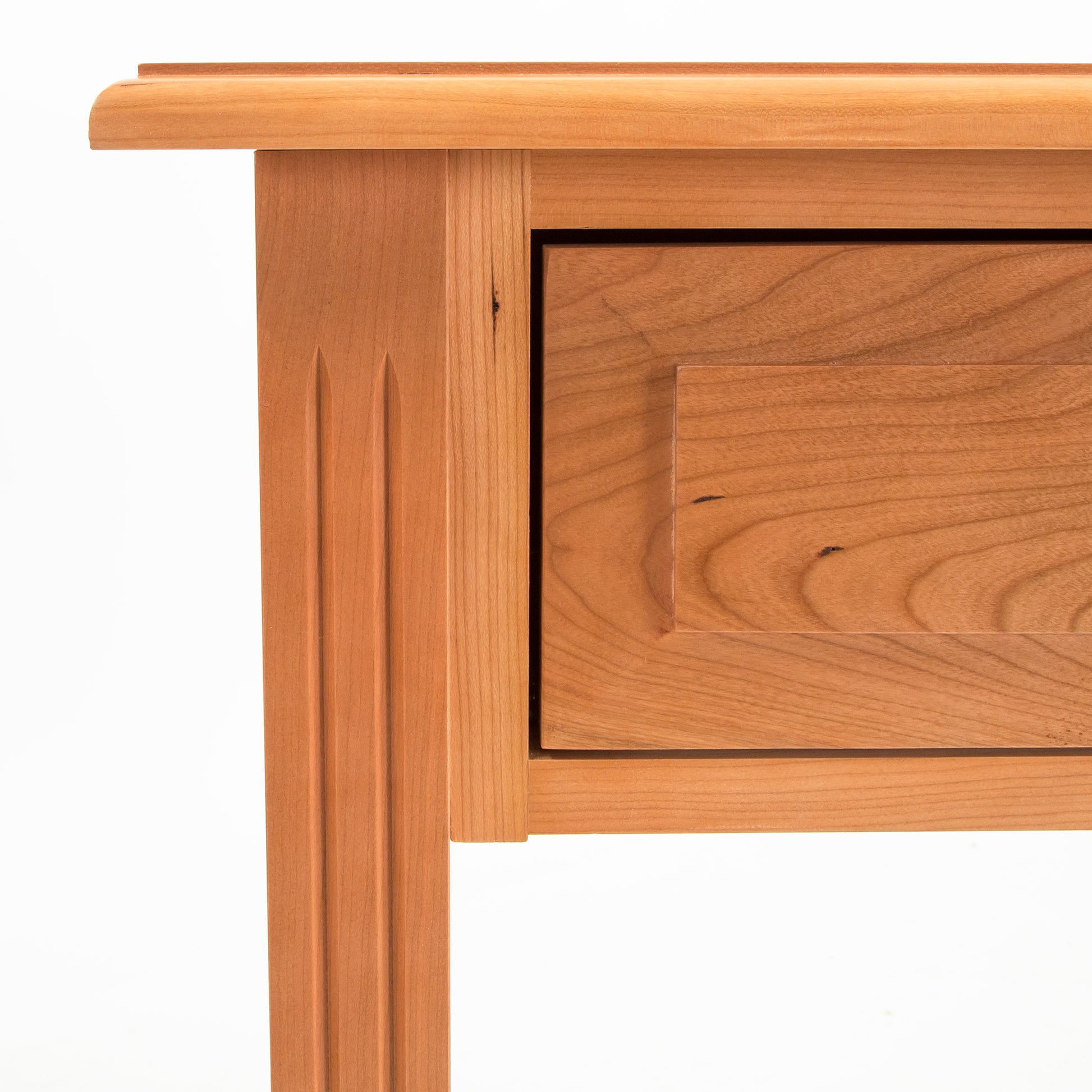 Renfrew Shaker 1-Drawer Open Shelf Nightstand by Lyndon Furniture featuring detailed wood grain, single drawer, and elegantly carved legs.