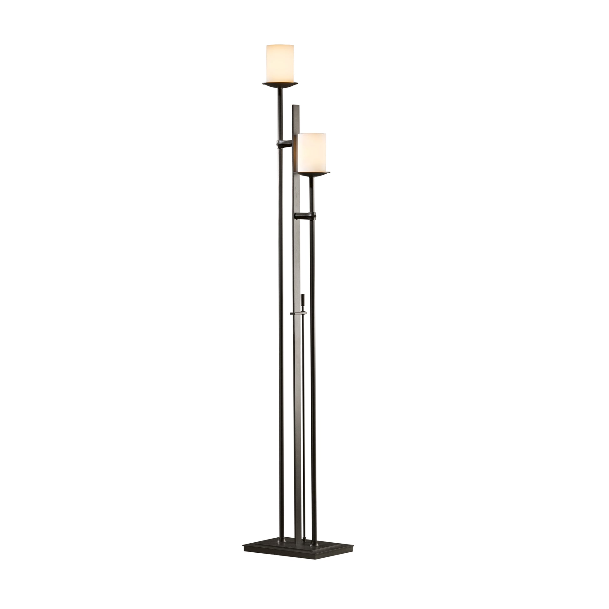 The Hubbardton Forge Rook Twin Floor Lamp features a sleek black design with a stylish white shade.