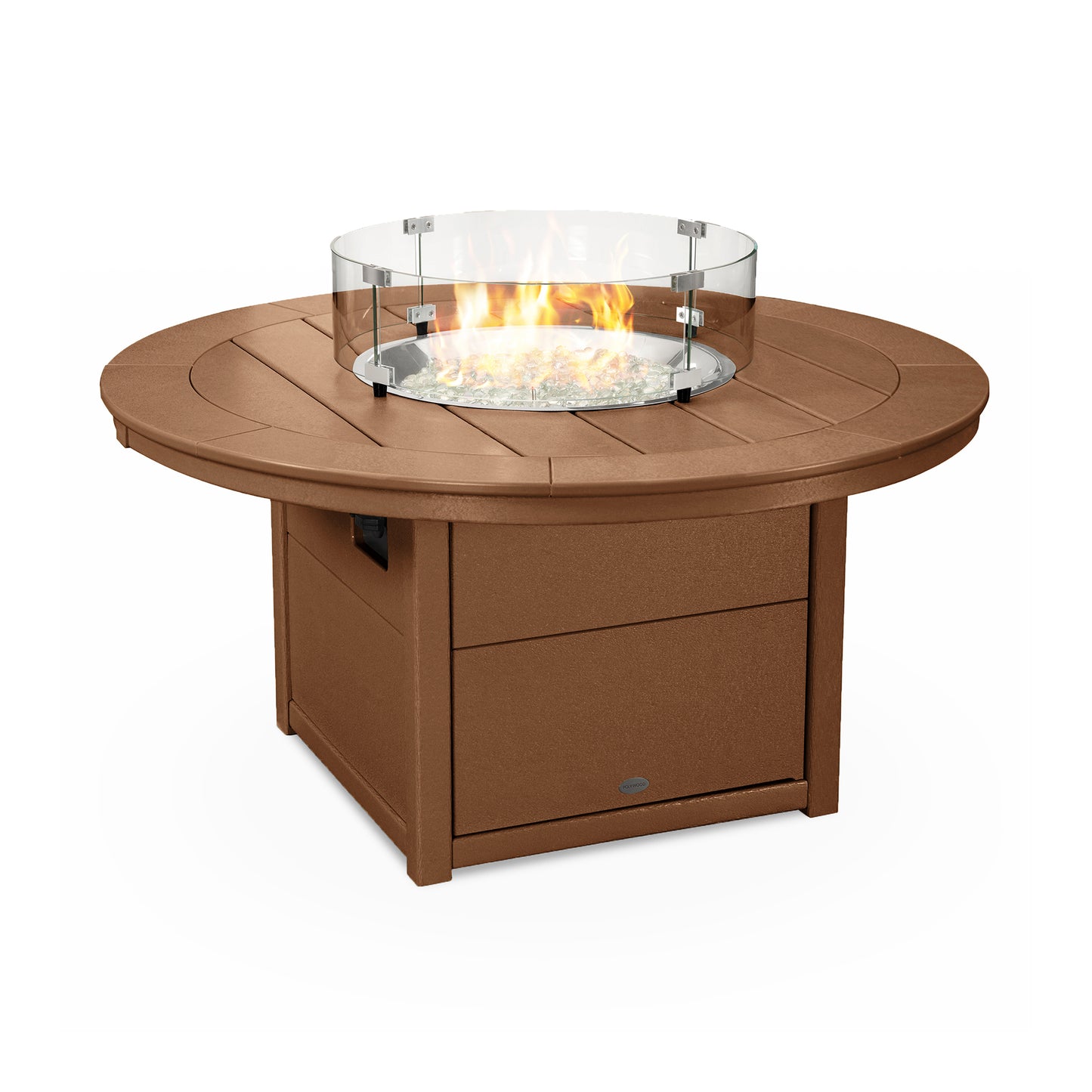 POLYWOOD Round 48" Fire Pit Table with a POLYWOOD® lumber base in a light brown color, featuring a glass wind guard. The fire is lit, showing orange flames over white fire glass beads.